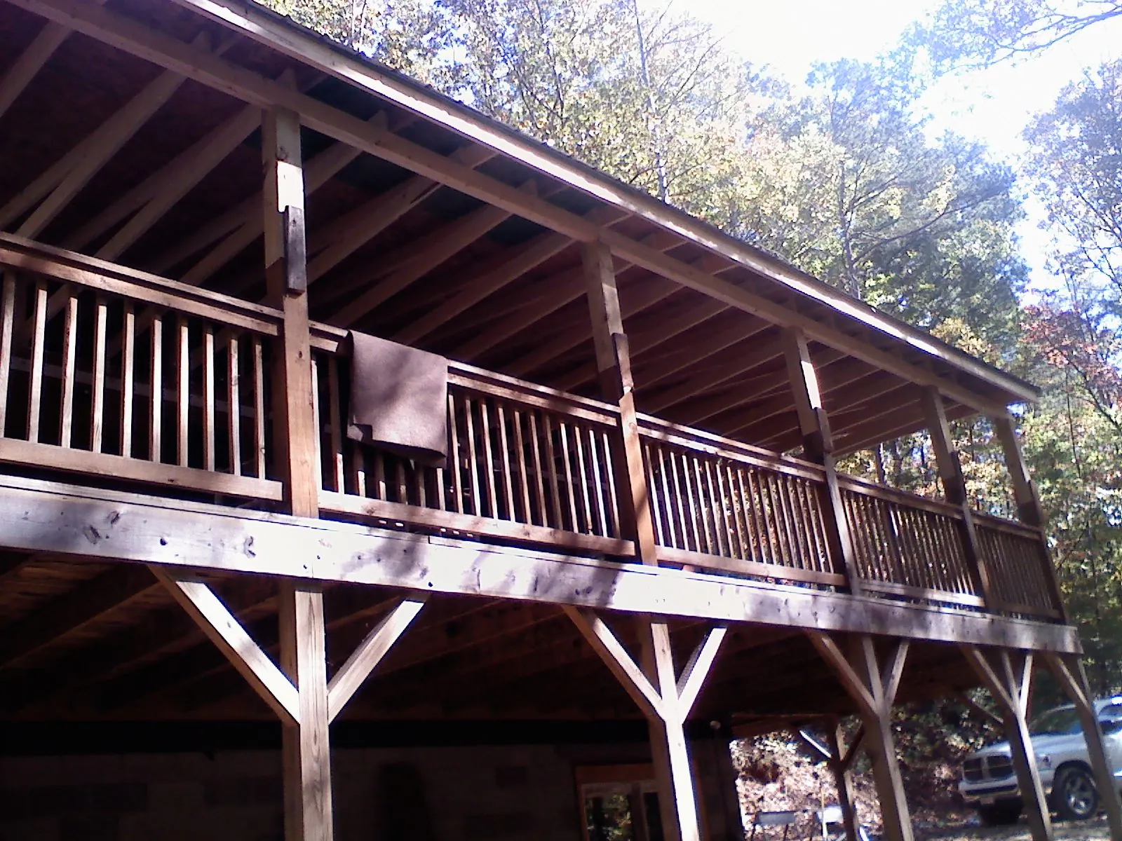 Timber framing under a new elevated porch and deck — Roof Leak Repair in Courtland by Roofing Brothers
